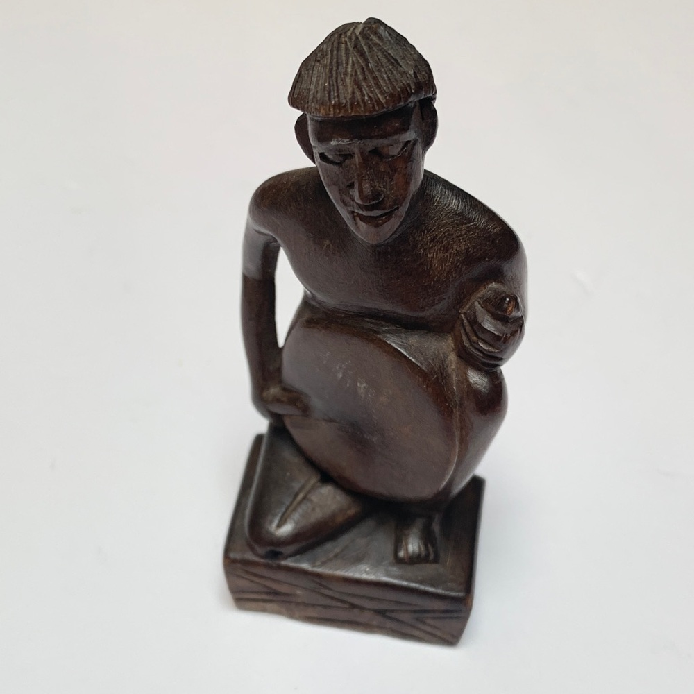 Artisan Carved Wooden Figurine. Size: 4.5x2.